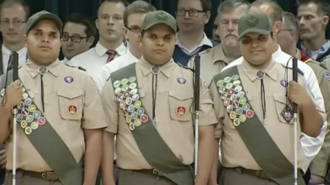 Blind triplets adopted by a blind man earn the highest rank in Boy Scouts