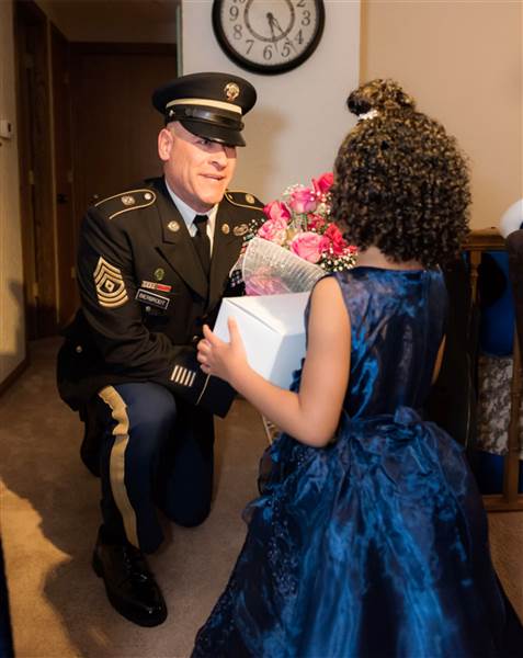 Military man wins hearts by taking the daughter of fallen serviceman to daddy-daughter dance