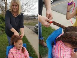 This little girl lost her mother, now her kind school bus driver braids her hair everyday