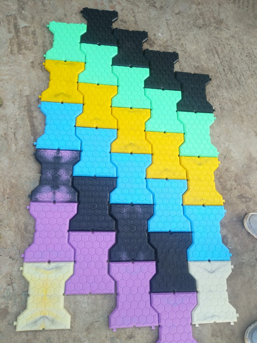This Indian NGO creates colorful, anti-slip tiles from plastic waste