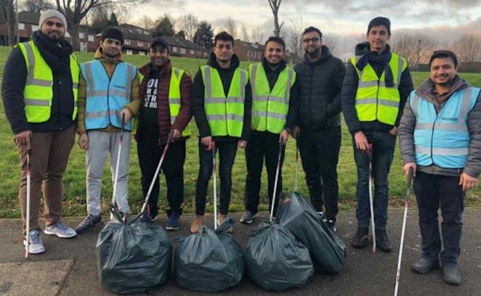 Members of this Muslim Youth Association took to streets early morning for New Year’s Day clean-up