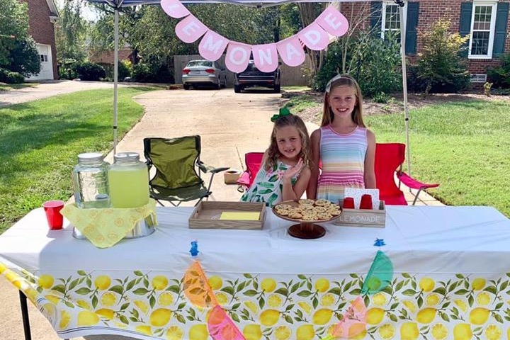 These little sisters raised over $5,000 to buy Thanksgiving meals for less fortunate families