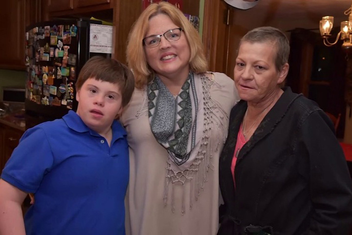 When the mom of a student with Down Syndrome dies of cancer, his teacher adopts him