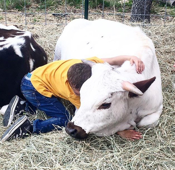 Here is a rescue farm that connects special needs kids with animals coming from similar background